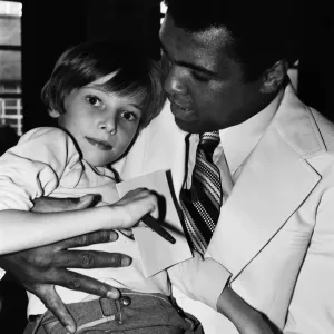 World heavyweight boxing champion Muhammad Ali presented a sunshine coach on the behalf World heavyweight boxing champion Muhammad Ali presented a sunshine coach on the behalf