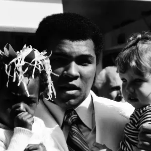 World heavyweight boxing champion Muhammad Ali presented a sunshine coach on the behalf World heavyweight boxing champion Muhammad Ali presented a sunshine coach on the behalf