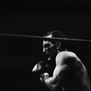 Combat du titre poids lourd mondial entre le champion américain Cassius Clay. Combat du titre poids lourd mondial entre le champion américain Cassius Clay.