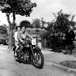 World Speedway Champion Freddie Williams seen here learning to ride his bike on the road