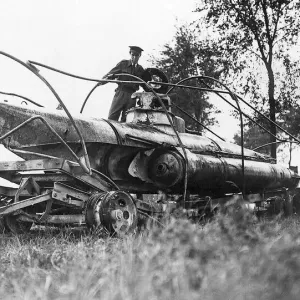 World War 2 September 1944 A British officer examines a captured German one-man World War 2 September 1944 A British officer examines a captured German one-man