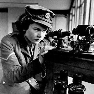 World War II Women. ATS Girls at Western Command Ordinance factory on Precision work