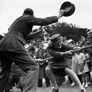 World War II Women: ATS women take part in a tug of war competition. August 1941 P010065