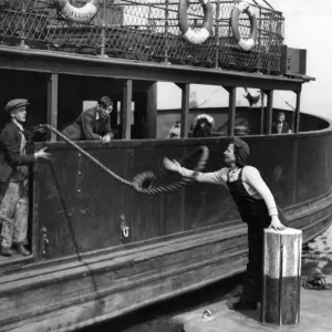 World War II: Women. Mrs. Ellen McShane at work on Jarrow on Tyne ferry. May 1942 P010288 World War II: Women. Mrs. Ellen McShane at work on Jarrow on Tyne ferry. May 1942 P010288