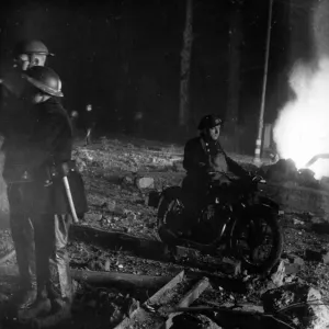 Through the wreckage of buildings, through fire and water, with bombs dropping Through the wreckage of buildings, through fire and water, with bombs dropping