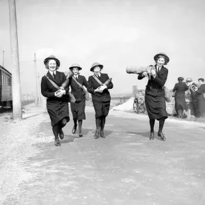Wrens carrying shells to a shore battery on the South Coast 1941 Women doing mens Wrens carrying shells to a shore battery on the South Coast 1941 Women doing mens