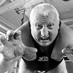 Wrestler Shirley Crabtree alias Big Daddy poses in the gym, July 1979