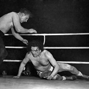 Wrestling match at Harringay. Jack Doyle in white trunks in action against Eddie Phillips