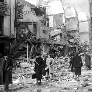 WW2 Air Raid Damage April 1941 Bomb damage in London People clear the streets