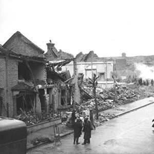 WW2 Air Raid Damage Bomb damage at East Ham - people survey the wreckage