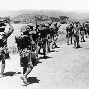WW2 British and Indian troops seen marching towards Keren