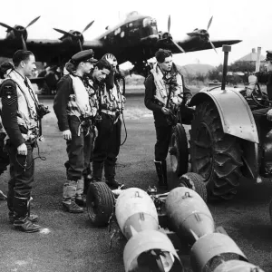 WW2 WaF Auxiliary Air Force driver discusses the arming of a bomber with its crew WW2 WaF Auxiliary Air Force driver discusses the arming of a bomber with its crew