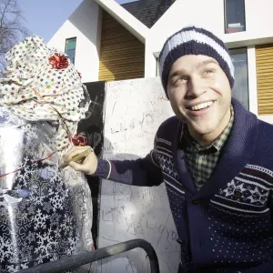X factor contestant Olly Murs greets a fan outside the finalists house X factor contestant Olly Murs greets a fan outside the finalists house