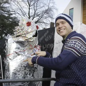X factor contestant Olly Murs greets a fan outside the finalists house X factor contestant Olly Murs greets a fan outside the finalists house