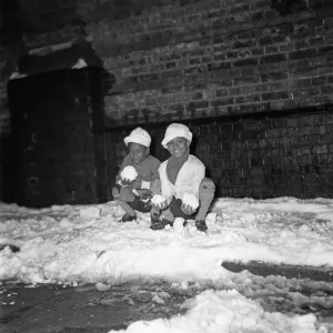 1955 Print: Jamaican Brothers Experience Snow in England