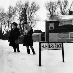 Eleven year old Thomasina Deere and her brother David brave the cold conditions to go Eleven year old Thomasina Deere and her brother David brave the cold conditions to go