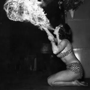 Black and white print of a woman in a cabaret setting