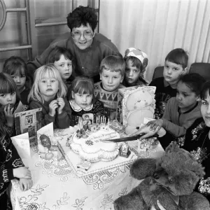 Ten years on... Mrs Lesley Holmes (right), leader of St Johns playgroup in Golcar