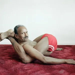 Yoga positions. Position is called Feet behind Neck (Dvi Pada Sirsasana Yoga positions. Position is called Feet behind Neck (Dvi Pada Sirsasana