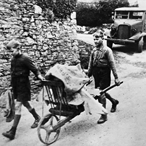 Two young Blackawton lads helping with the evacuation of the village