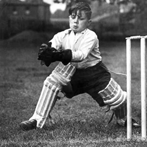 Young boy keeping wicket. 7th July 1946