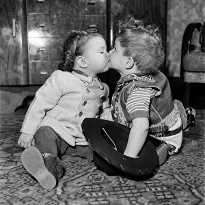 Young children kissing February 1953 D972
