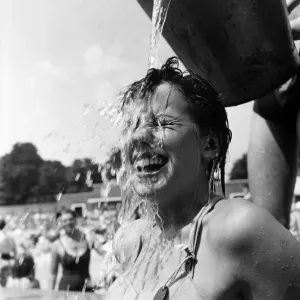Young girl keeps cool during the hot weather. July 1952 C3326 Young girl keeps cool during the hot weather. July 1952 C3326