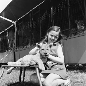 Young girl is a lion tamer, Teesside, Circa 1972