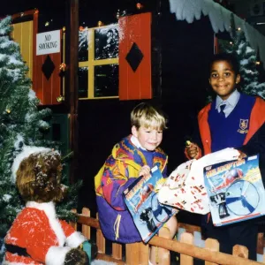 Young helpers, Smiley Crabbe, on the right, and Sean Behan pictured outside Santa Young helpers, Smiley Crabbe, on the right, and Sean Behan pictured outside Santa