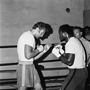 A young Joe Bugner going through his paces with World Heavyweight Champ Joe Frazier