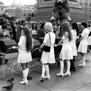 Print of Six young ladies with prams in Trafalgar Square Print of Six young ladies with prams in Trafalgar Square