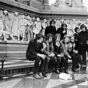 Young pop stars gathered at the Albert Memorial in London for a bread and water lunch to draw attention to Oxfams Christmas appeal. Pictured, Elaine Osborn serving bread and water to Roger Waters, Nick Mason, Syd Barrett, Rick Wright, Barry Fantoni