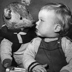Young toddler with his teddy bear January 1954 P003901