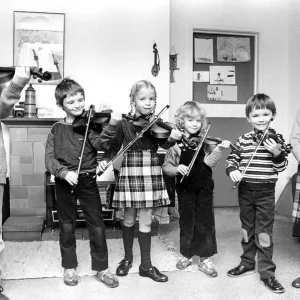 Young violinists getting in some practice in October 1982 Young violinists getting in some practice in October 1982