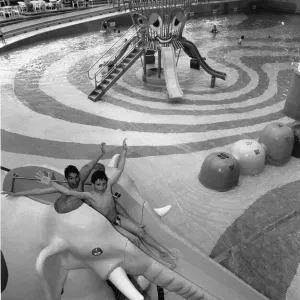 Two young visitors enjoys the Elephant water chute at Rhyl Suncentre. 23rd May 1996 Two young visitors enjoys the Elephant water chute at Rhyl Suncentre. 23rd May 1996