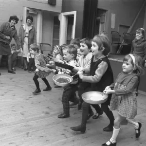 Youngsters take part in a pancake race at Styvechale Young Wives Club in Coventry Youngsters take part in a pancake race at Styvechale Young Wives Club in Coventry