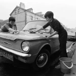Youth club boys clean cars. 1971 Youth club boys clean cars. 1971