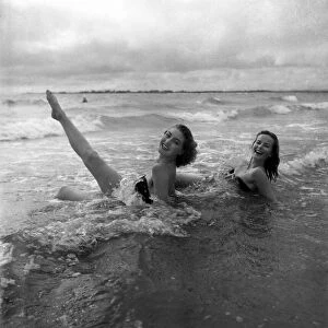 Yvonne Marsh and Ann Hanslip seen here bathing in the sea at West Wittering