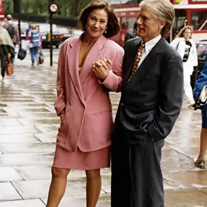 Zoe Wanamaker Actress and Adam Faith Actor and former 60s Pop Singer hold hands while