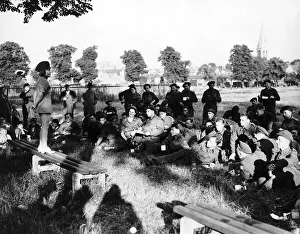 10 year old Edna McCundle entertains troops waiting for the invasion of Europe 1944 WW2