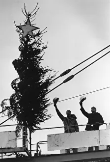 Toxteth Prints: 100 ft up and crane drivers Ken Jones and Tommy Brett wave as they finish the job of
