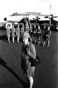11 air stewardesses who earned their wings after passing the Northeast Airlines air