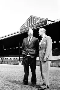 00326 Prints: After 13 years with the club, Eddie Lowe (left) takes a look around Craven Cottage