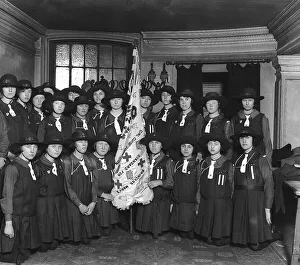 The 13th Camberwell Girl Guides are pictured holding the Princess Mary Standard