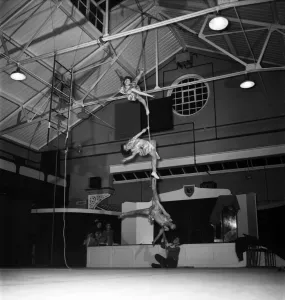 14 year old Johnny Pugh is the son of Digger Pugh who runs a troupe of 25 hire wire girls