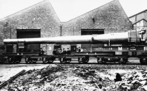 Artillery Prints: A 15 Naval gun is loaded on to a waiting train at The Royal Ordnance Works at Stoney