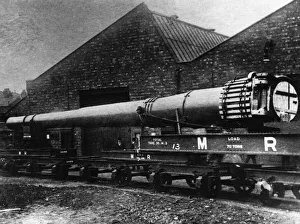 00616 Prints: A 15 Naval gun is loaded on to a waiting train at The Royal Ordnance Works at Stoney