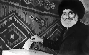 Ussr Prints: 152 year old Shirin Baba Gasanov casts his vote in the local elections in Russia
