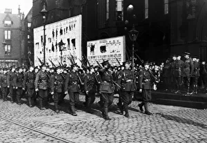Recruitment Prints: The 16th Manchesters march past Lord Kitchener at Manchester Town Hall with the rest of