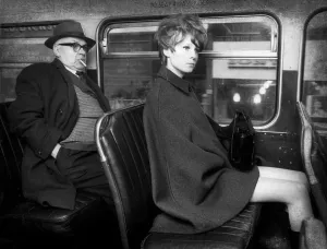 Cape Prints: 17 year old Lynn Teall of Glasgow travels to work after getting up late